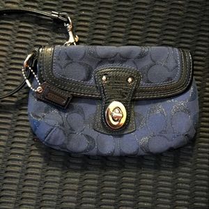 Coach dark blue and black in signature block wristlet